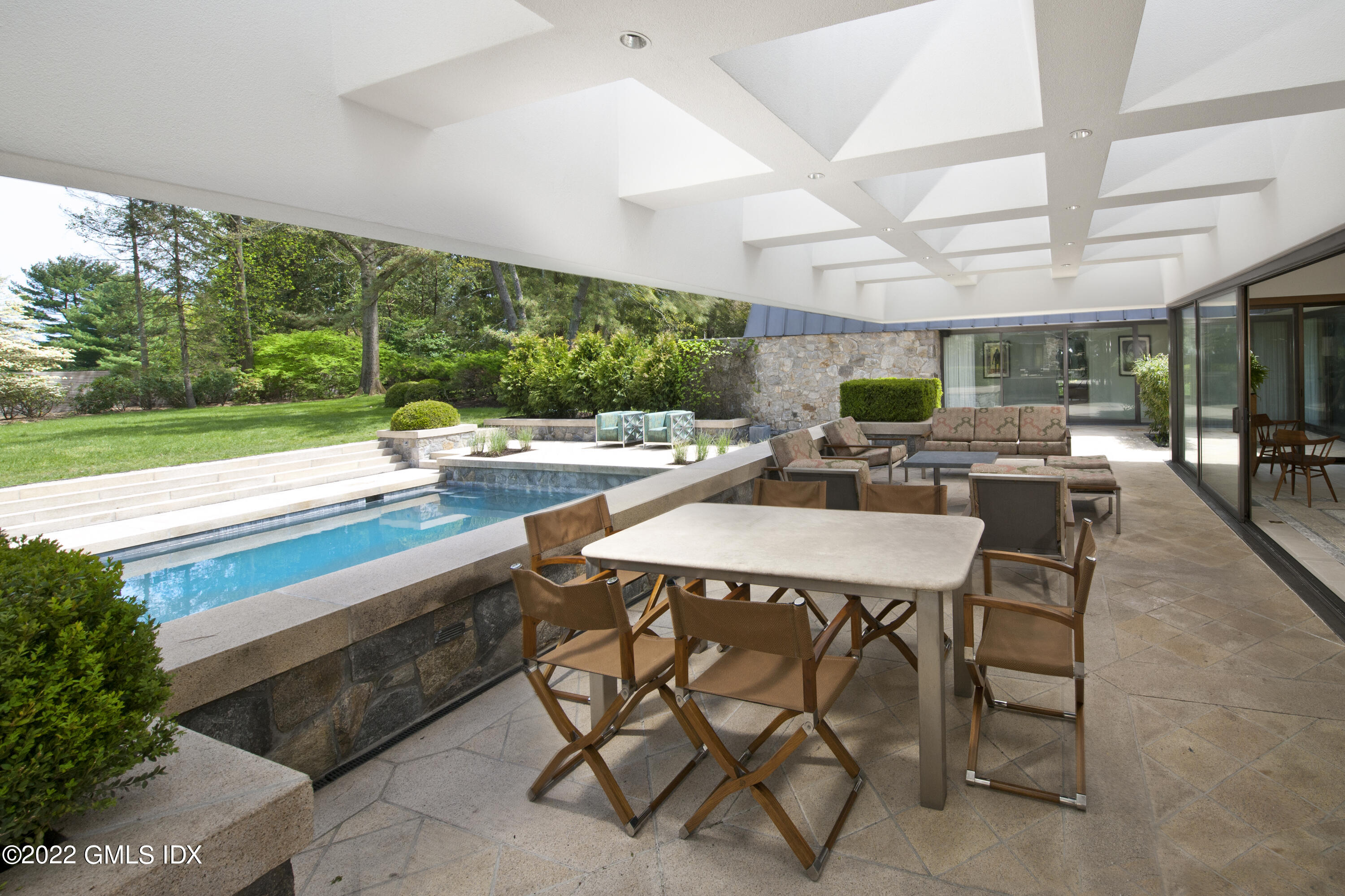 3 North Stanwich Road Greenwich, CT 06831 - Photo 30 of 35 a outdoor space with a large pool table and chairs
