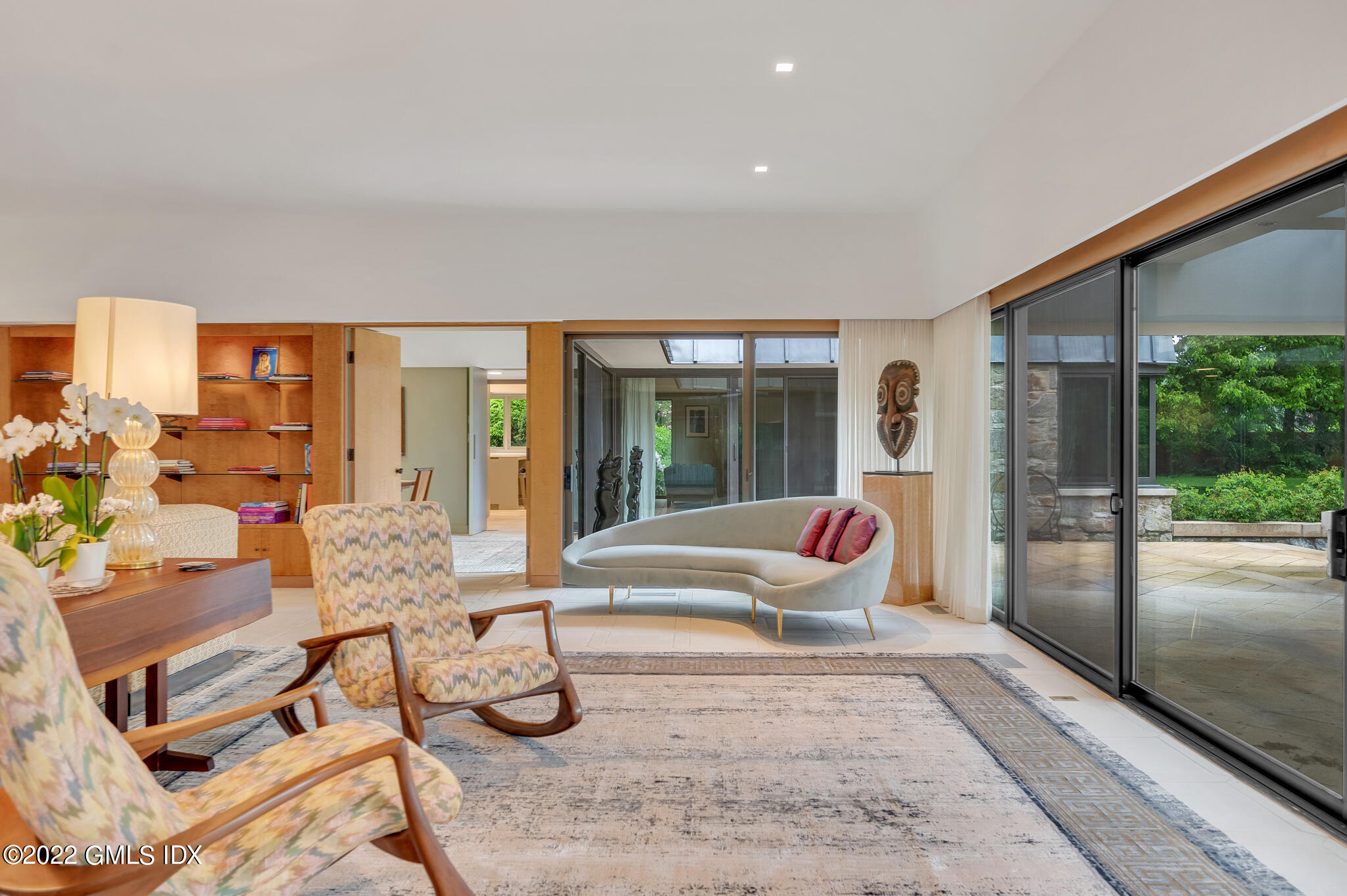 3 North Stanwich Road Greenwich, CT 06831 - Photo 7 of 35 a living room with furniture and large windows