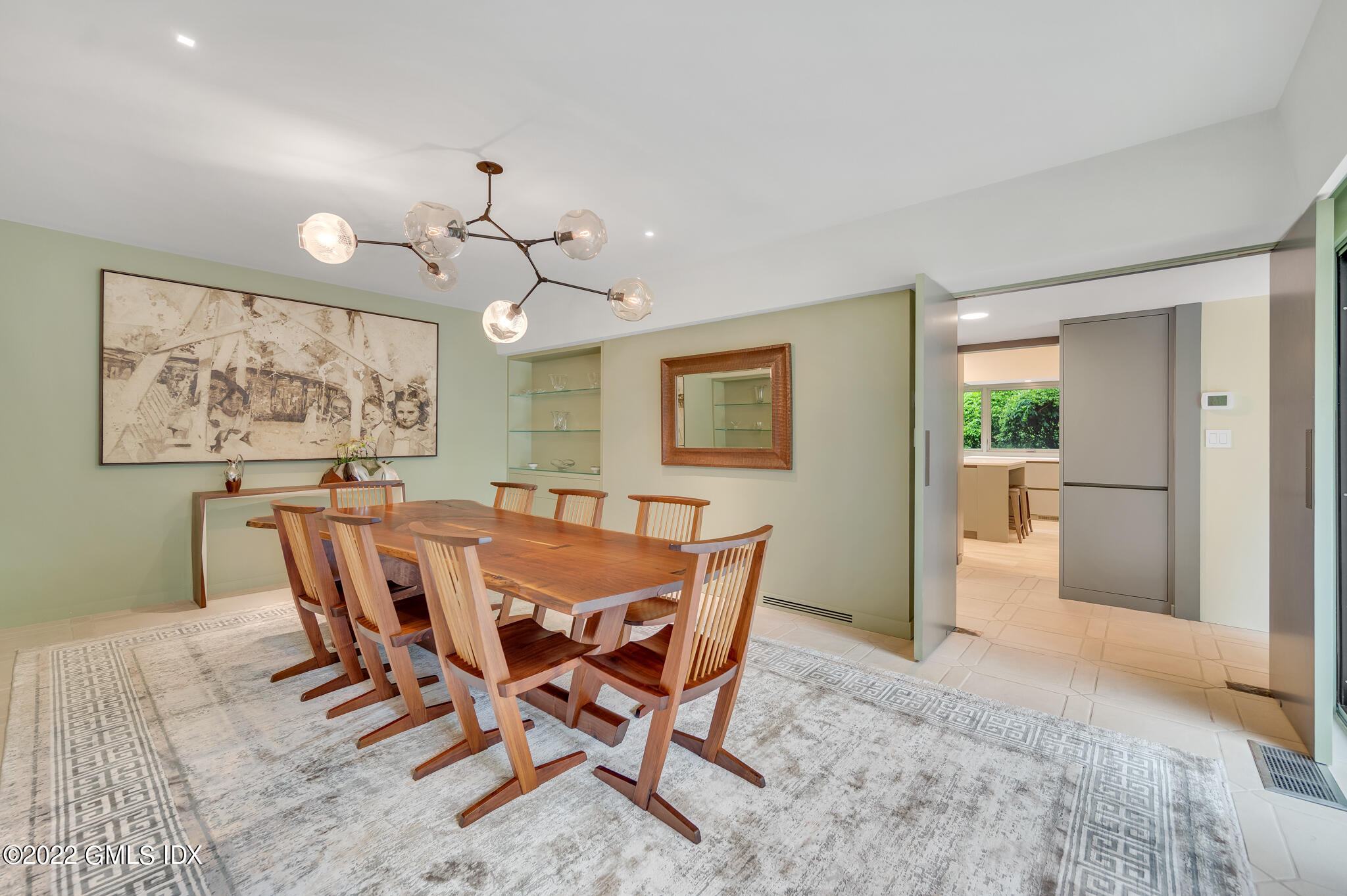 3 North Stanwich Road Greenwich, CT 06831 - Photo 8 of 35 a view of a dining room with furniture and chandelier fan
