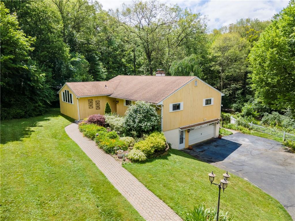16 Birch Hill Drive Poughkeepsie, NY 12603 - Photo 1 of 1 View of front of home featuring a garage and a front yard