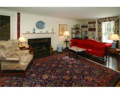 41 Aberdeen Road Weston, MA 02493 - Photo 3 of 6 a living room with furniture a rug and a fireplace