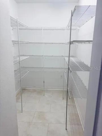 a bathroom with a glass door shower