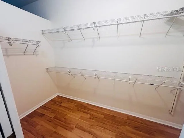 a view of a room with racks on the wall