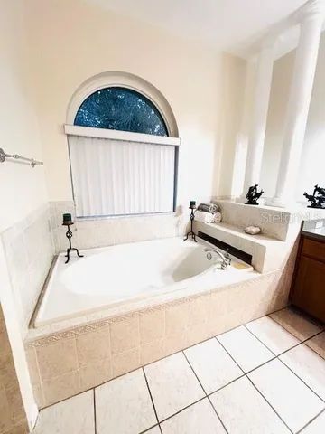 a bathroom with a sink and a shower