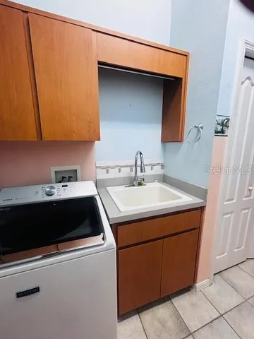 a view of a playground with green space