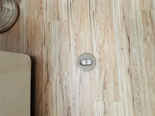 a view of a yard with large trees