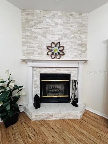 a living room with a fireplace
