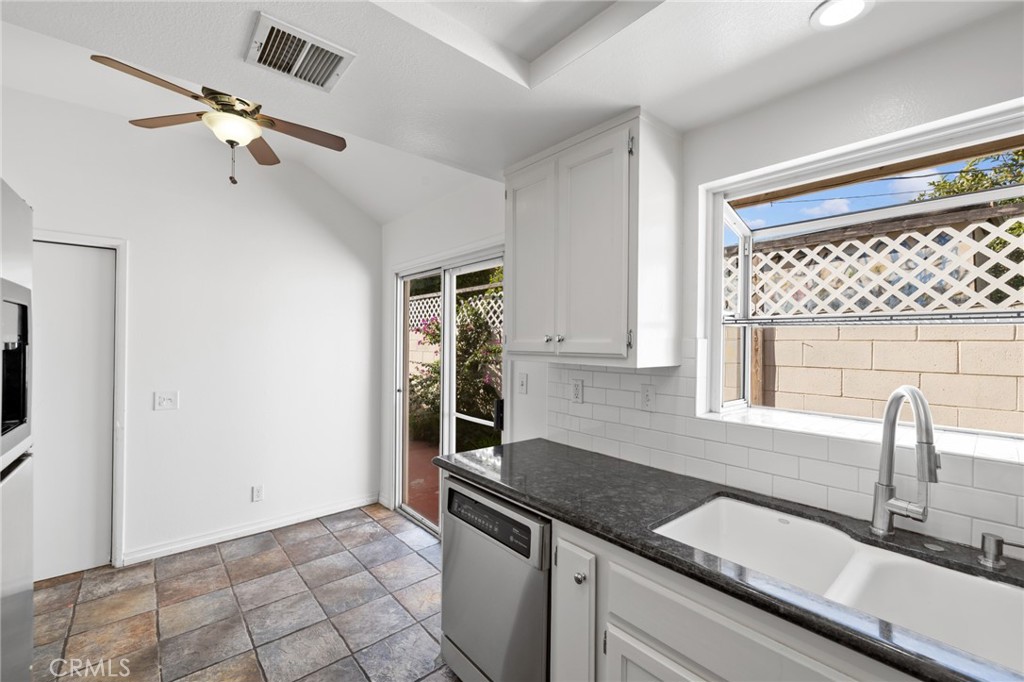 856 West Olive Avenue, Unit C Monrovia, CA 91016 - Photo 19 of 37 a kitchen with a sink and a refrigerator