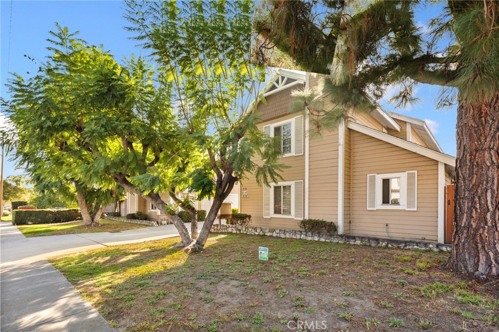 856 West Olive Avenue, Unit C Monrovia, CA 91016 - Photo 2 of 37 a view of a house with a tree