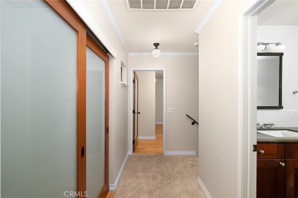856 West Olive Avenue, Unit C Monrovia, CA 91016 - Photo 26 of 37 a view of a hallway with closet and a window
