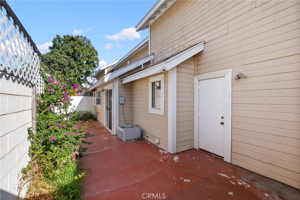 856 West Olive Avenue, Unit C Monrovia, CA 91016 - Photo 34 of 37 a view of a house with a backyard