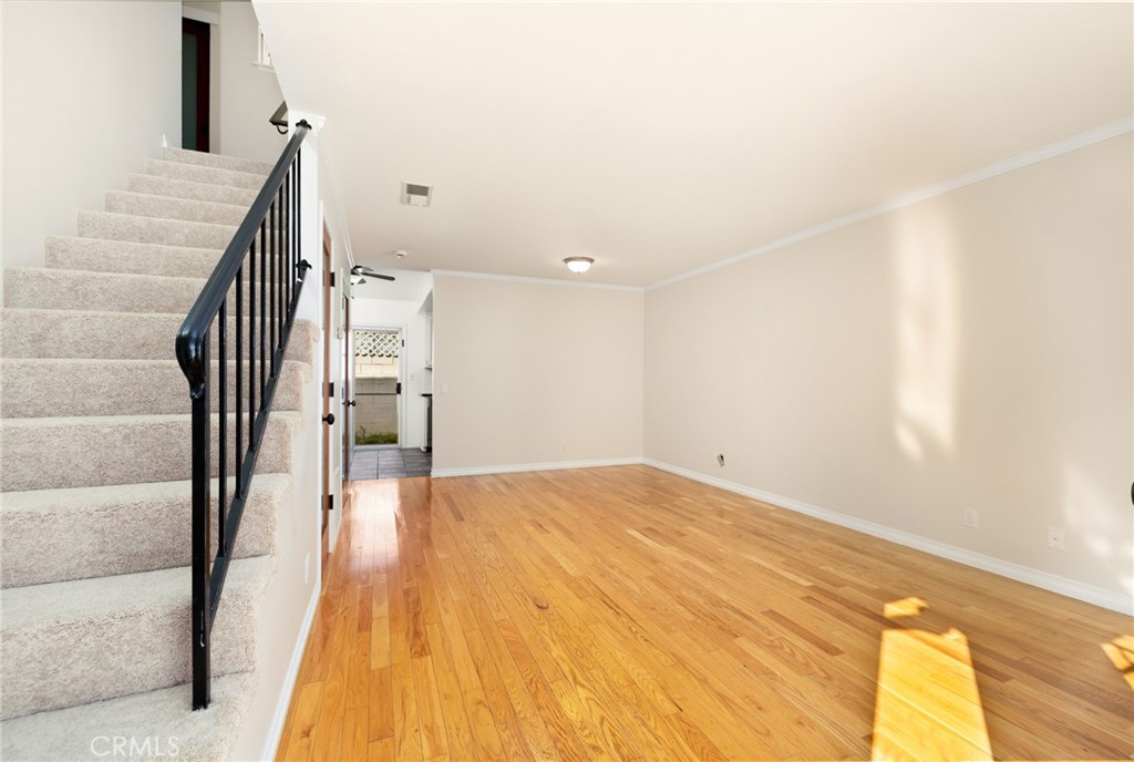 856 West Olive Avenue, Unit C Monrovia, CA 91016 - Photo 6 of 37 a view of an empty room with wooden floor