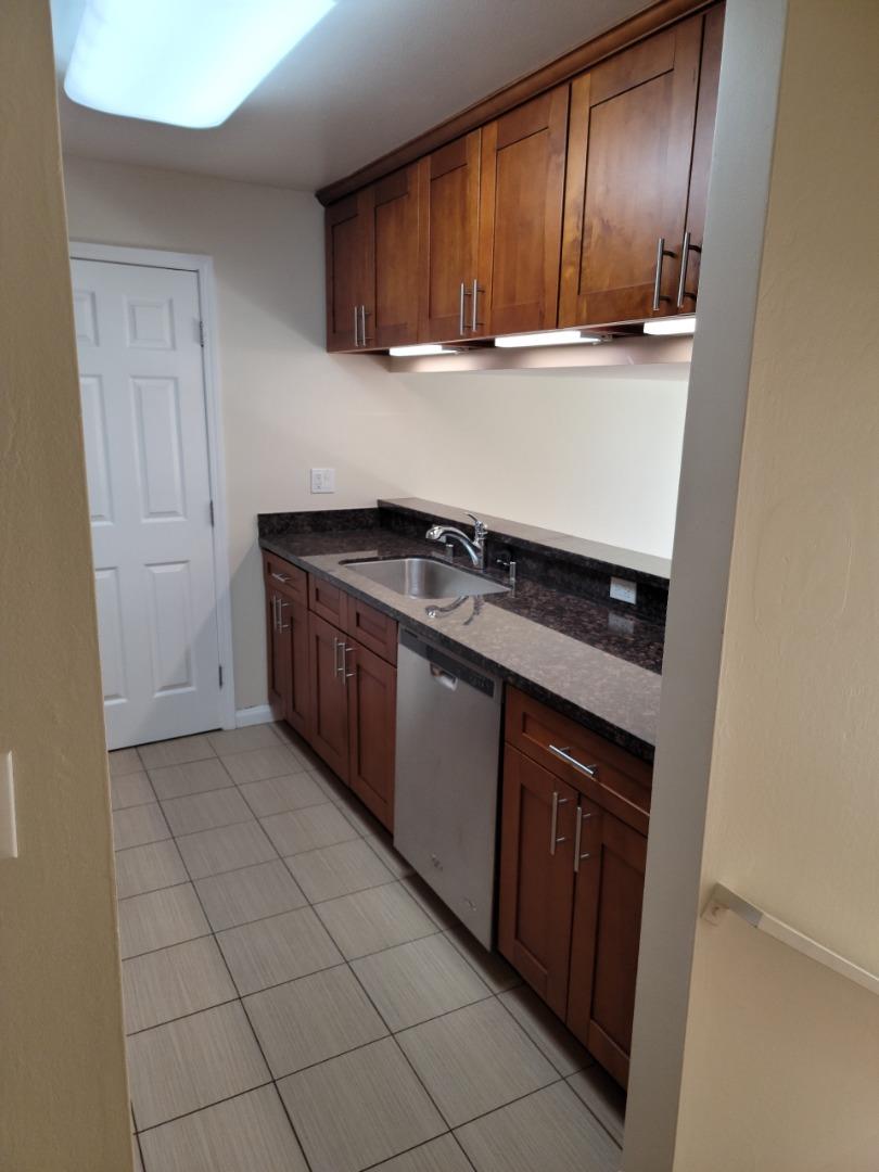 2006 Klamath Avenue, Unit 2 Santa Clara, CA 95051 - Photo 7 of 13 a kitchen with a stove and a sink