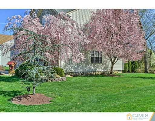 2 Stratton Road Old Bridge, NJ 07747 - Photo 2 of 24 a view of a garden with a building