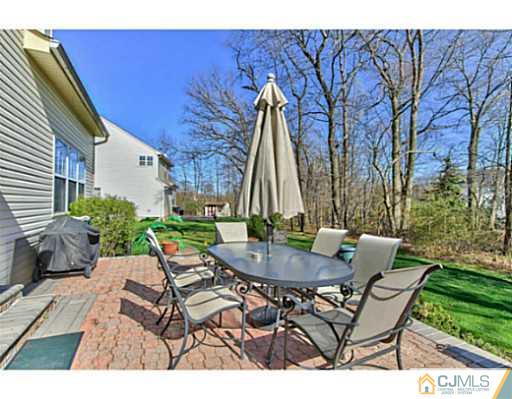 2 Stratton Road Old Bridge, NJ 07747 - Photo 22 of 24 a view of a patio with a table and chairs