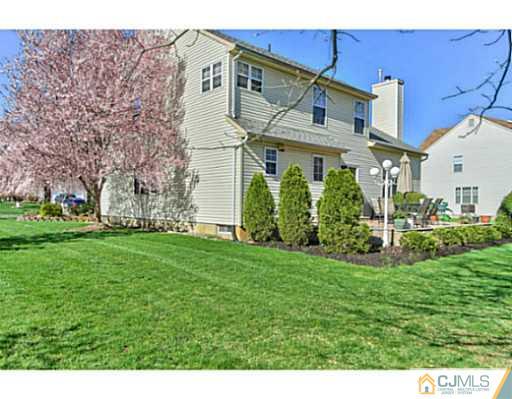 2 Stratton Road Old Bridge, NJ 07747 - Photo 24 of 24 a front view of a house with a garden
