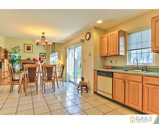 2 Stratton Road Old Bridge, NJ 07747 - Photo 10 of 24 a open kitchen with stainless steel appliances granite countertop a sink and cabinets