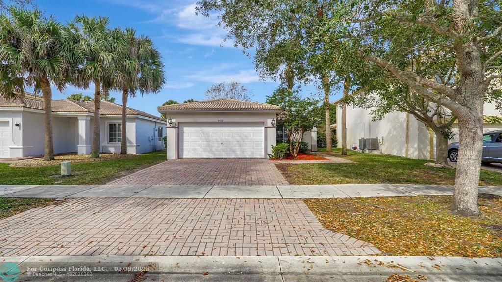 front view of house with a yard