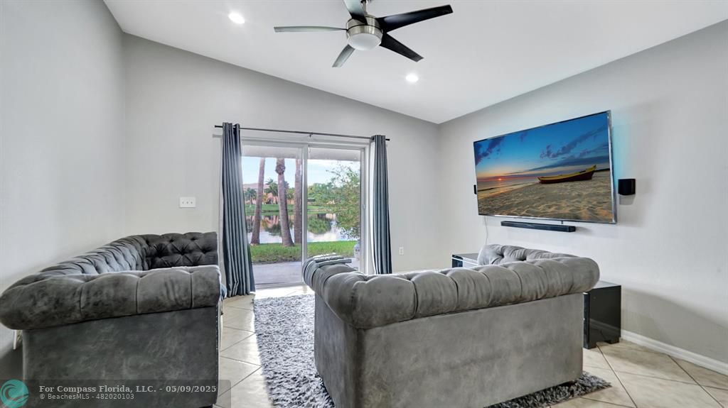 4558 Southwest 125th Lane Miramar, FL 33027 - Photo 11 of 47 a living room with furniture and a window