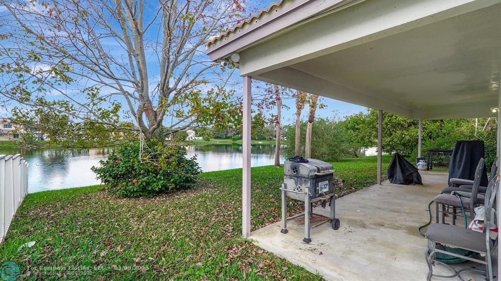 4558 Southwest 125th Lane Miramar, FL 33027 - Photo 31 of 47 a garden view with a seating space
