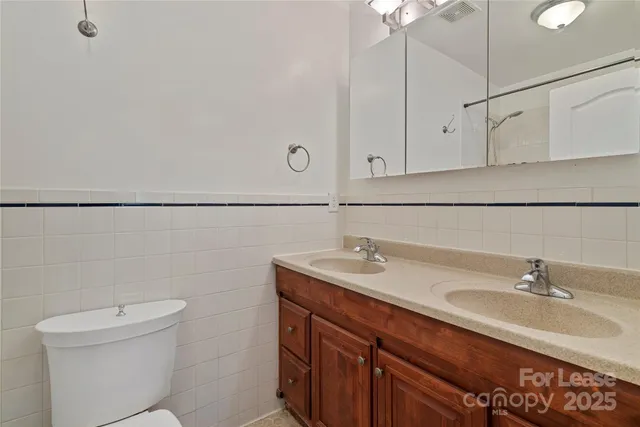 a bathroom with a sink and a toilet