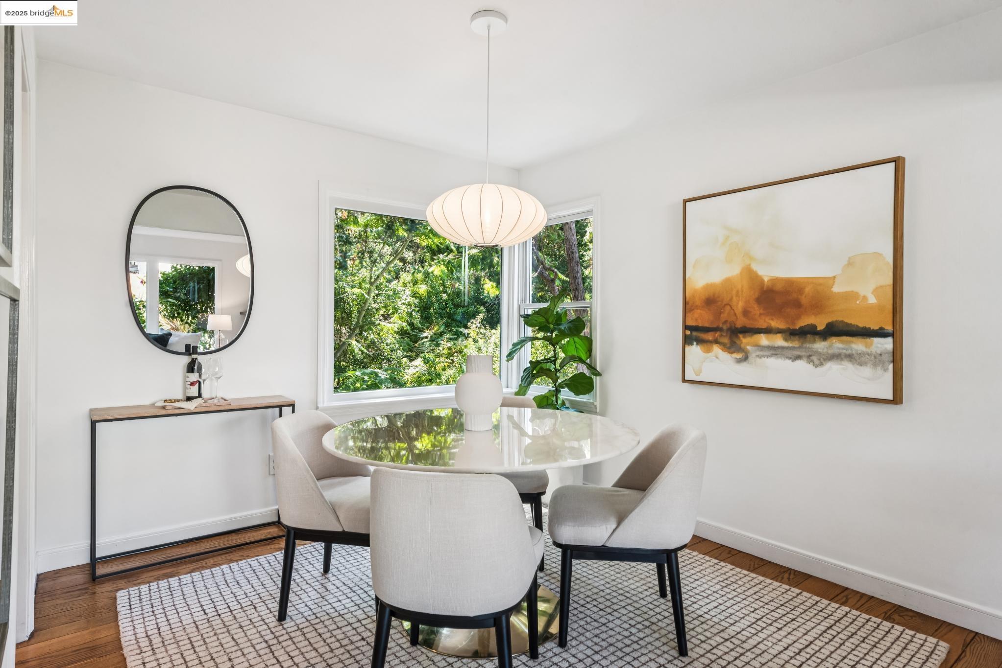 4479 Elinora Avenue Oakland, CA 94619 - Photo 11 of 47 Dining room with wood finished floors and baseboards
