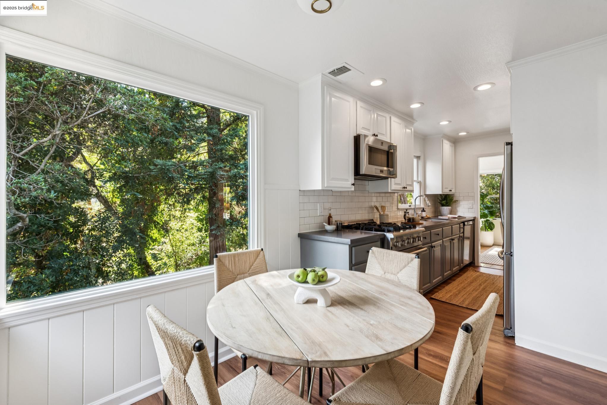 4479 Elinora Avenue Oakland, CA 94619 - Photo 17 of 47 Dining space featuring ornamental molding, recessed lighting, and dark wood-style flooring
