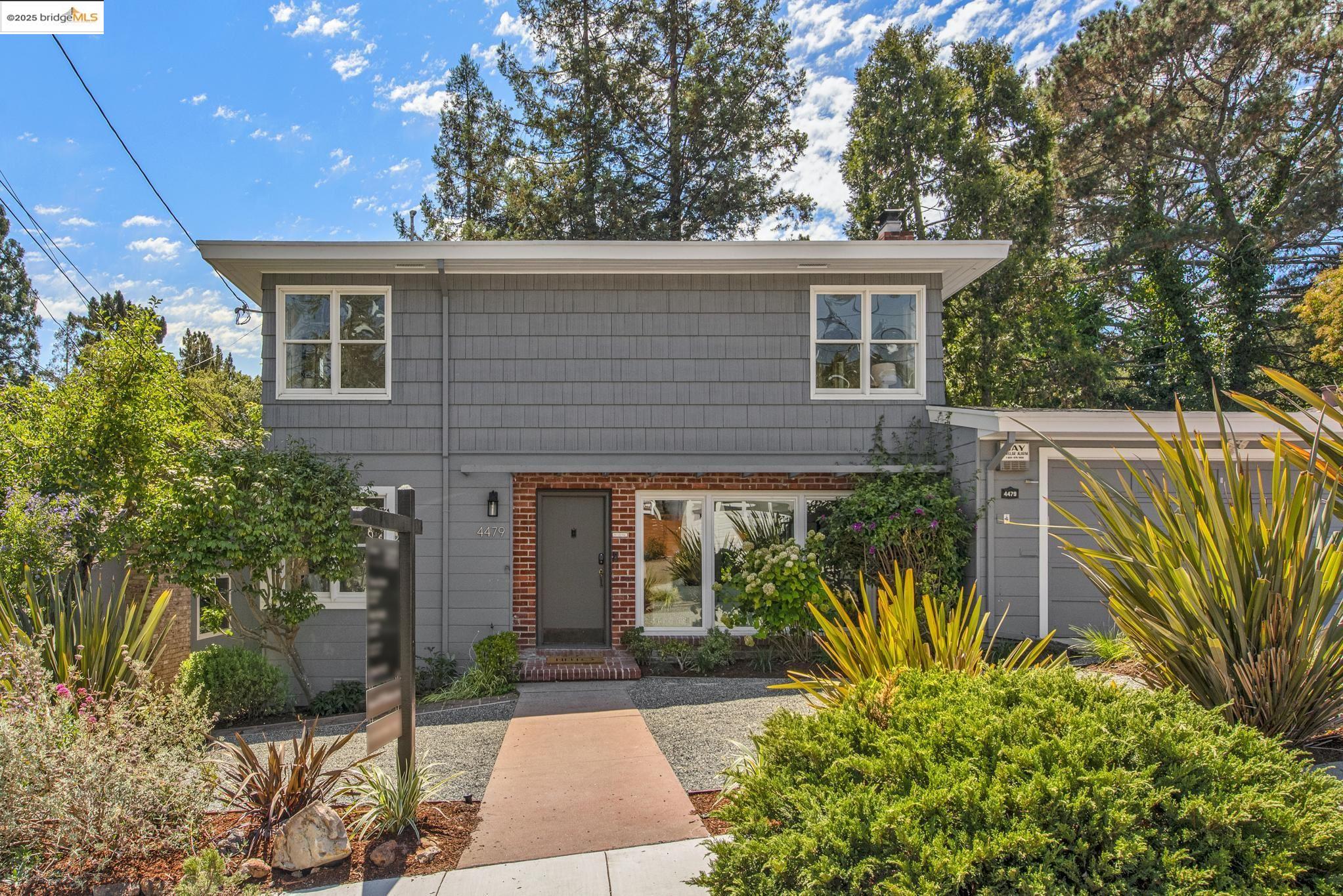 4479 Elinora Avenue Oakland, CA 94619 - Photo 2 of 47 View of front of home featuring brick siding and a chimney