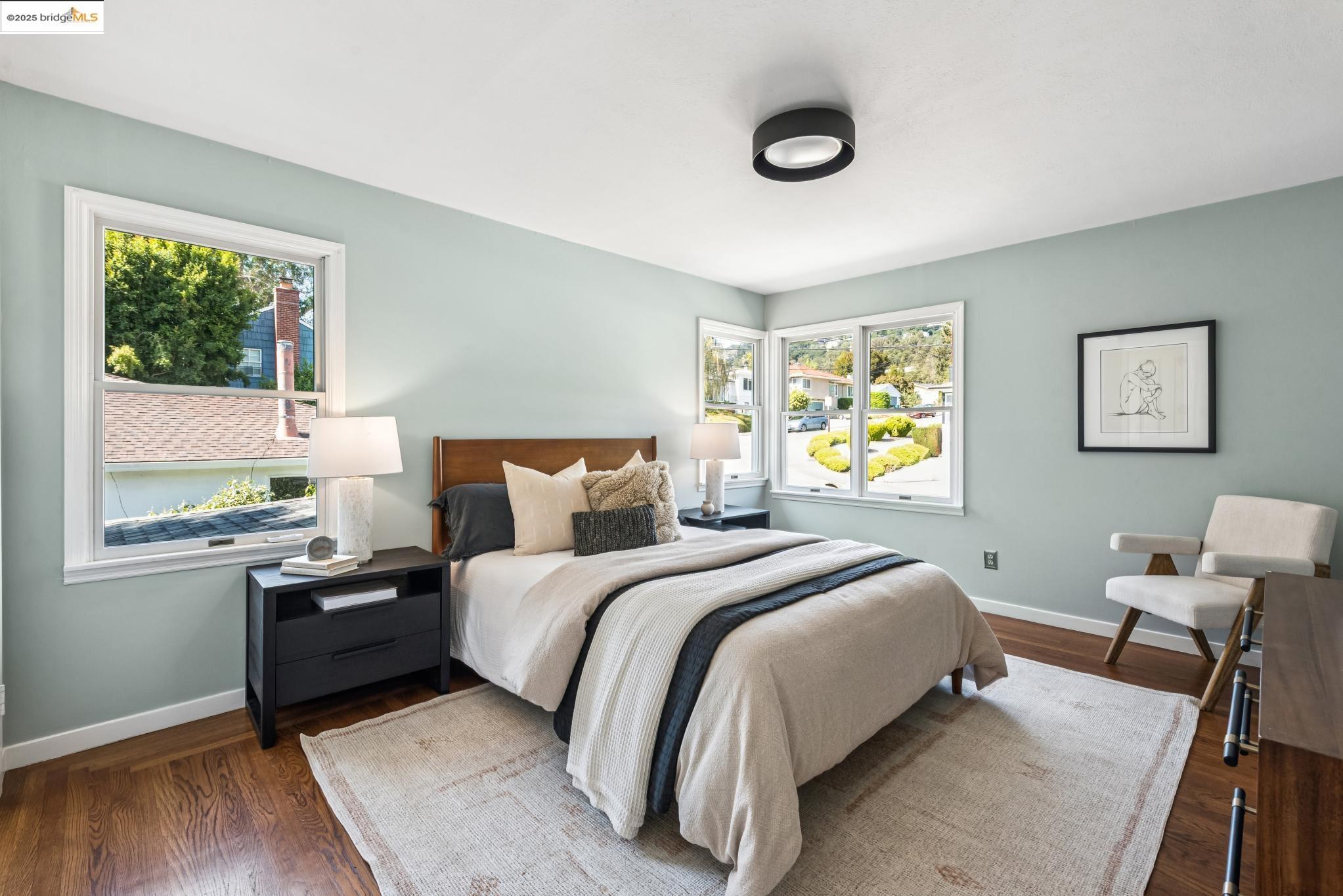 4479 Elinora Avenue Oakland, CA 94619 - Photo 21 of 47 Bedroom featuring dark wood-type flooring