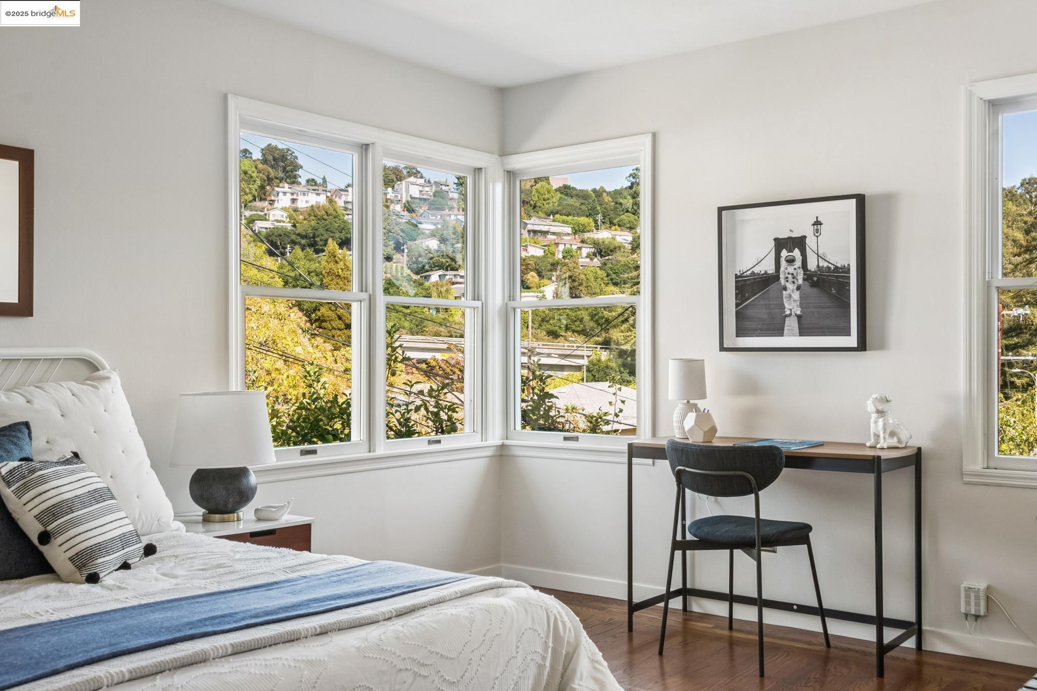 4479 Elinora Avenue Oakland, CA 94619 - Photo 27 of 47 Bedroom featuring dark wood finished floors and multiple windows