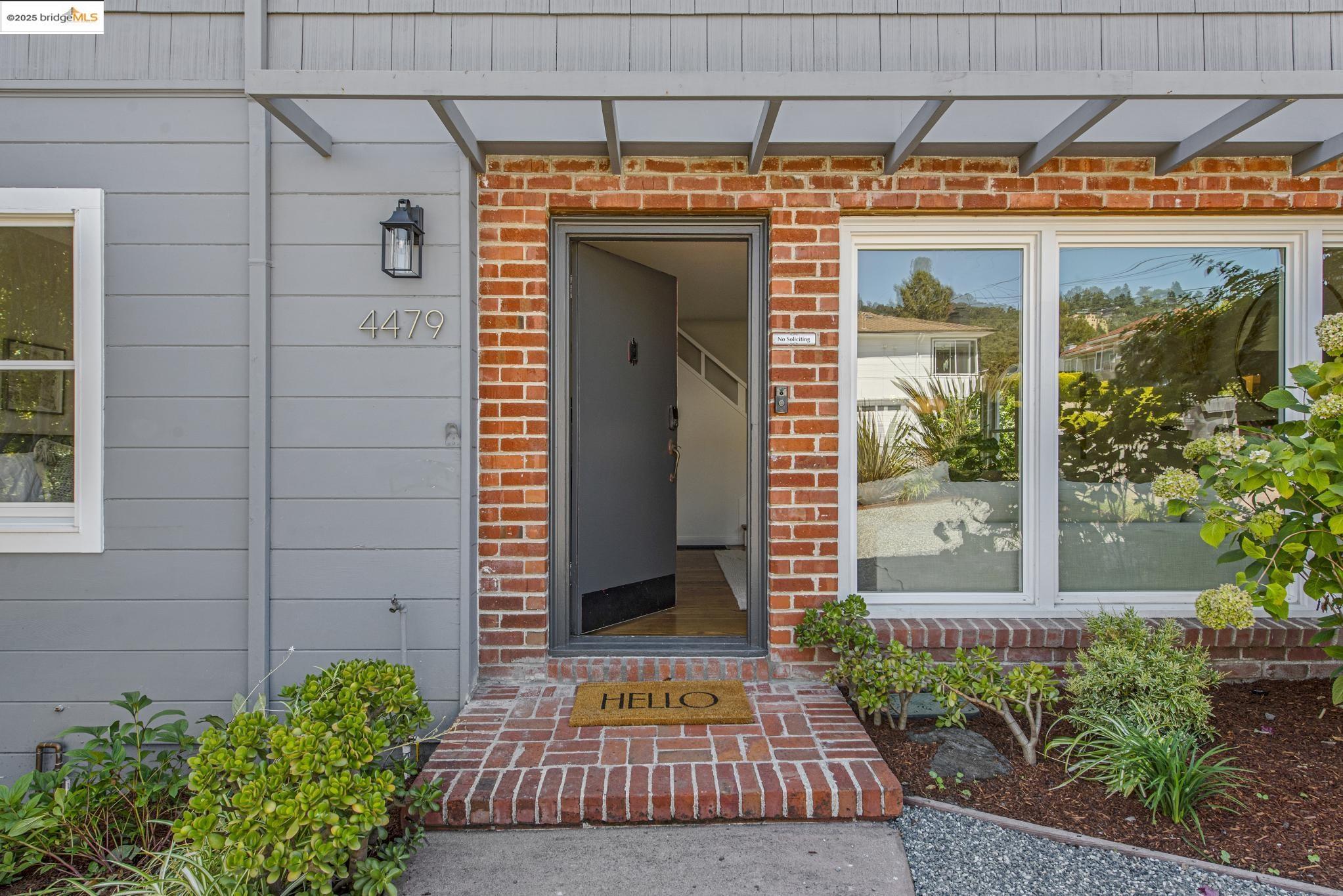 4479 Elinora Avenue Oakland, CA 94619 - Photo 4 of 47 View of exterior entry with brick siding