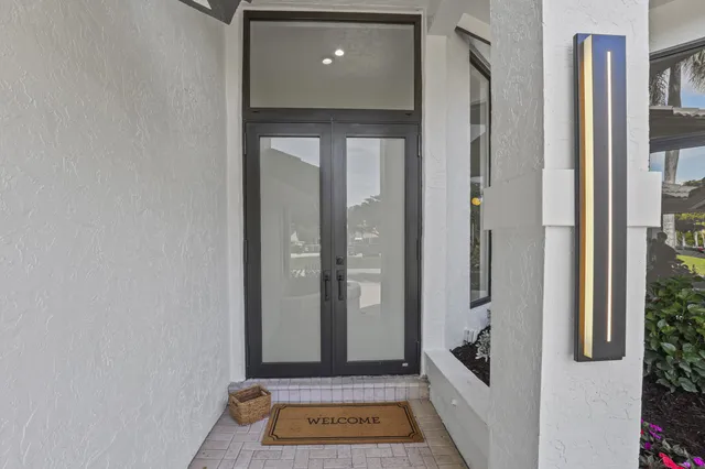 a view of a entryway door with living room