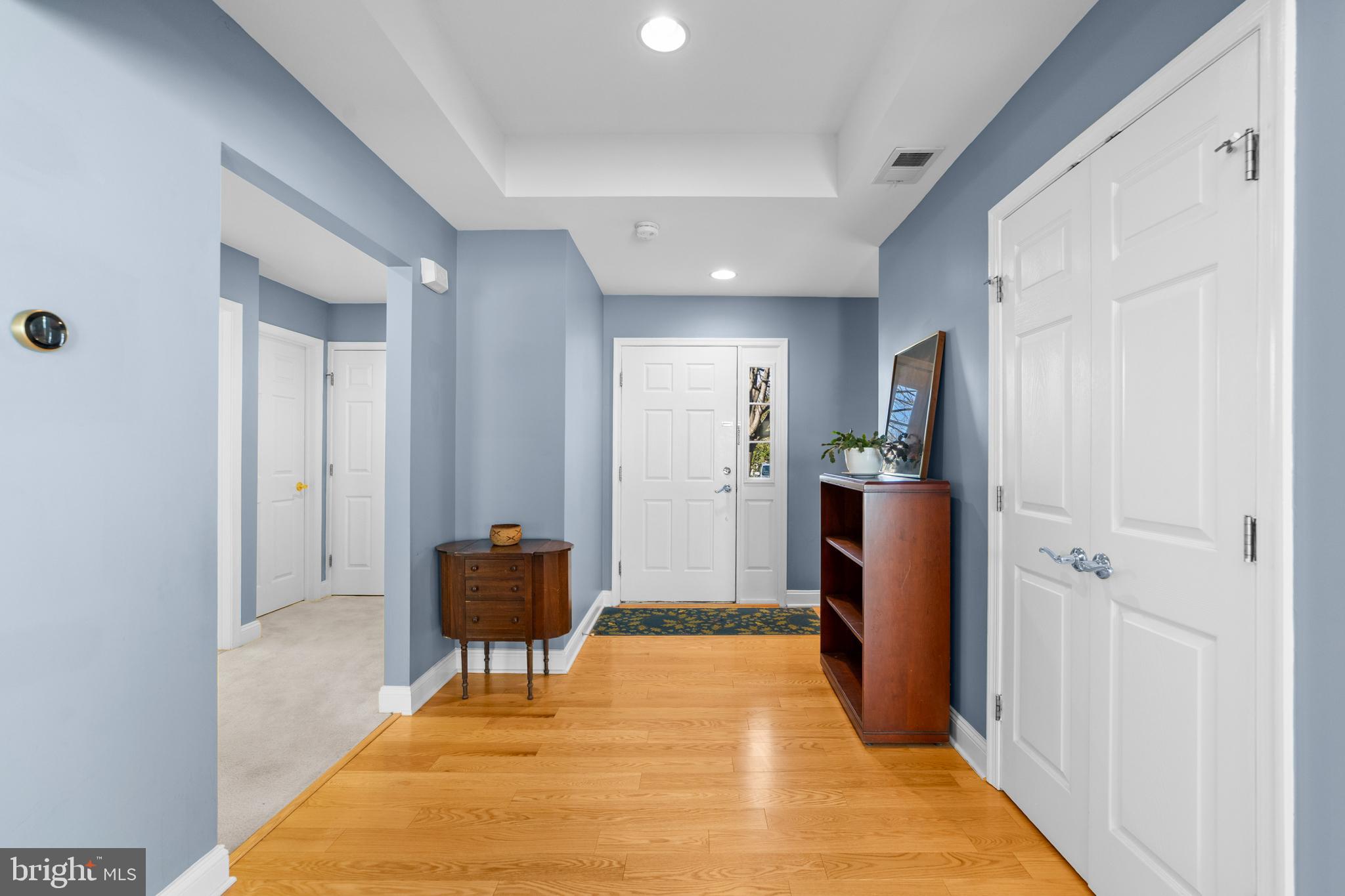 47 Hedge Row Road Princeton, NJ 08540 - Photo 2 of 21 a bedroom with a bed and a chandelier