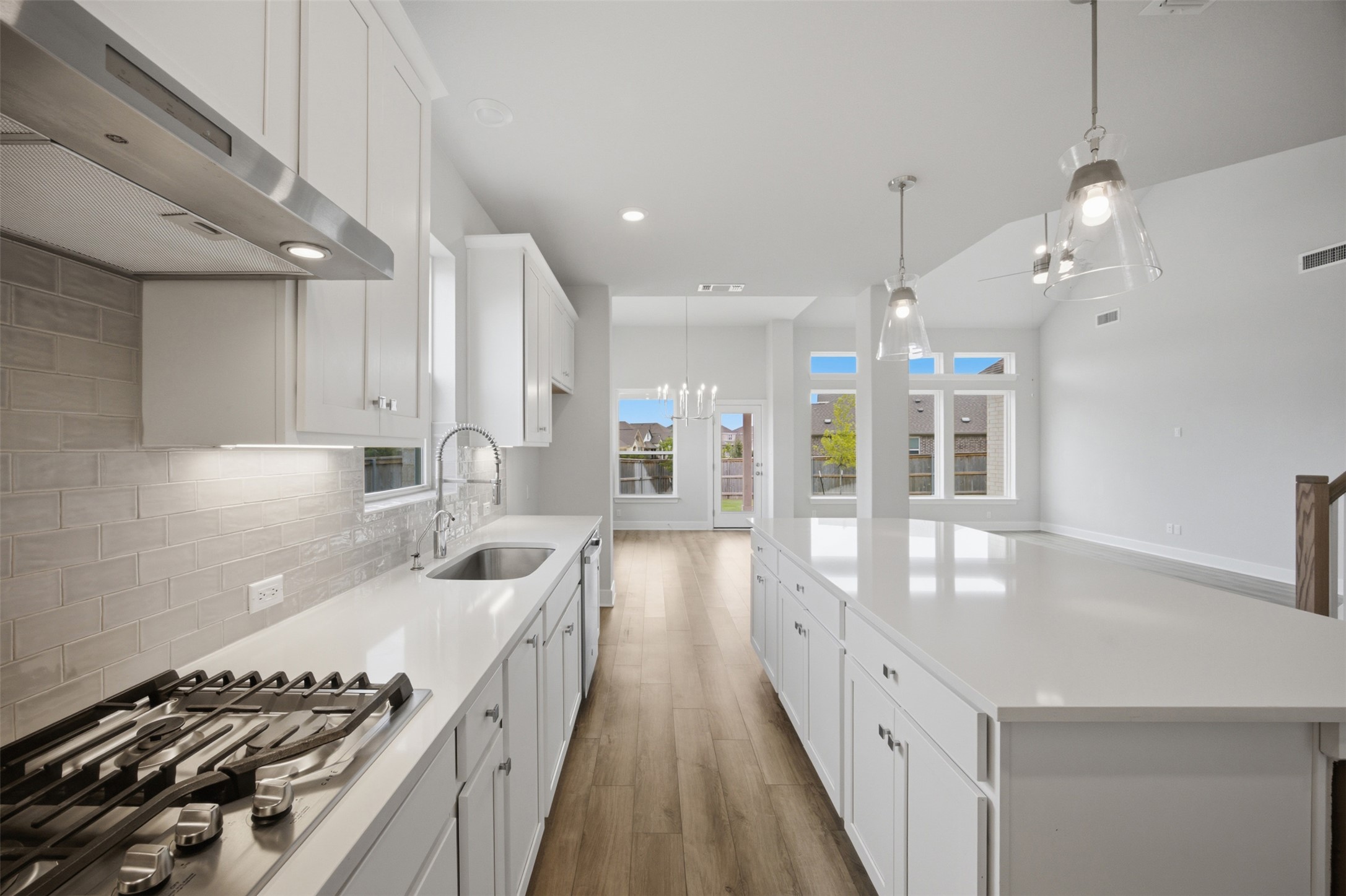 2101 Little Snake Way Georgetown, TX 78633 - Photo 10 of 37 Culinary creations come to life in this kitchen, complete with a generous island and sleek appliances.