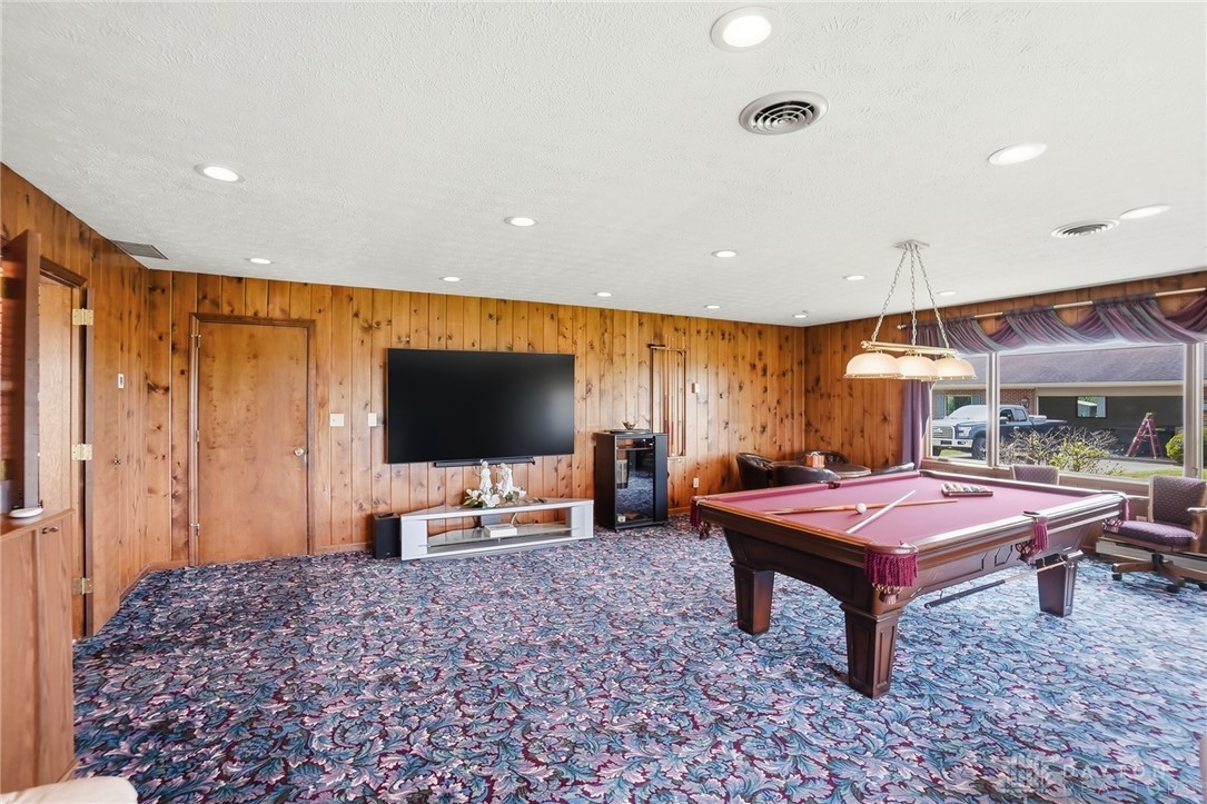 5669 O Neall Road Waynesville, OH 45068 - Photo 31 of 72 This versatile recreation room offers ample space for entertainment and leisure activities.