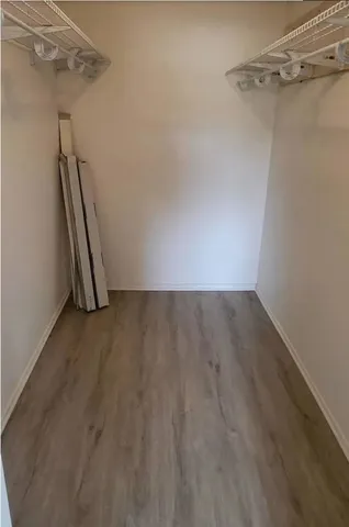 a view of a room with racks on the wall