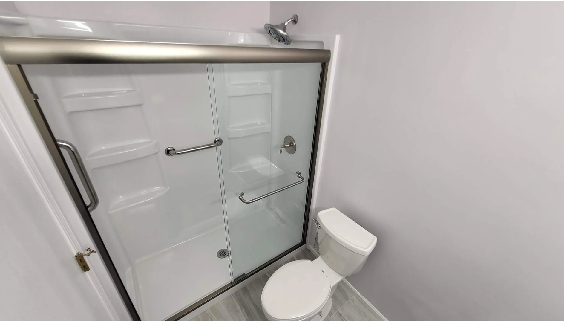 1186 Auburn Lane, Unit 1186 Buffalo Grove, IL 60089 - Photo 15 of 23 a white toilet sitting next to a shower
