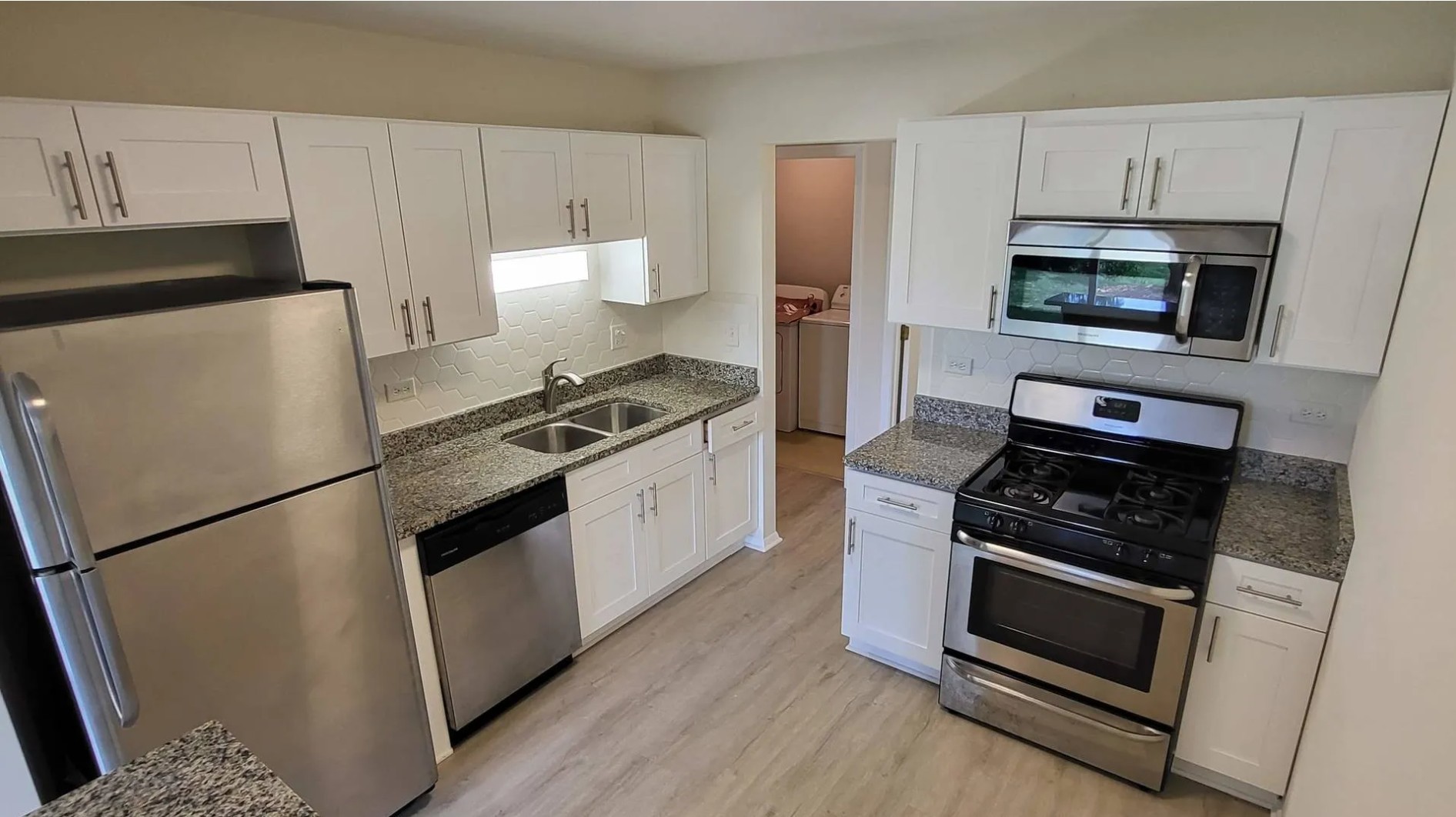 1186 Auburn Lane, Unit 1186 Buffalo Grove, IL 60089 - Photo 10 of 23 a kitchen with cabinets and steel stainless steel appliances