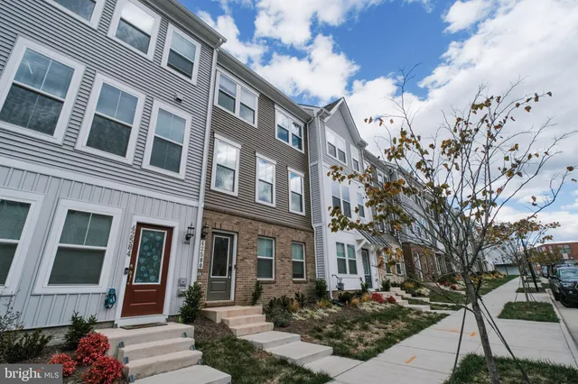 a front view of a multi story residential apartment building