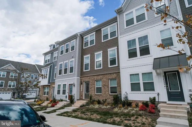 a front view of a building with street view