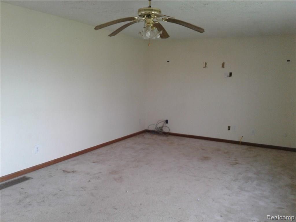 17995 Sherman Road Milan, MI 48160 - Photo 7 of 14 Living Room.jpg