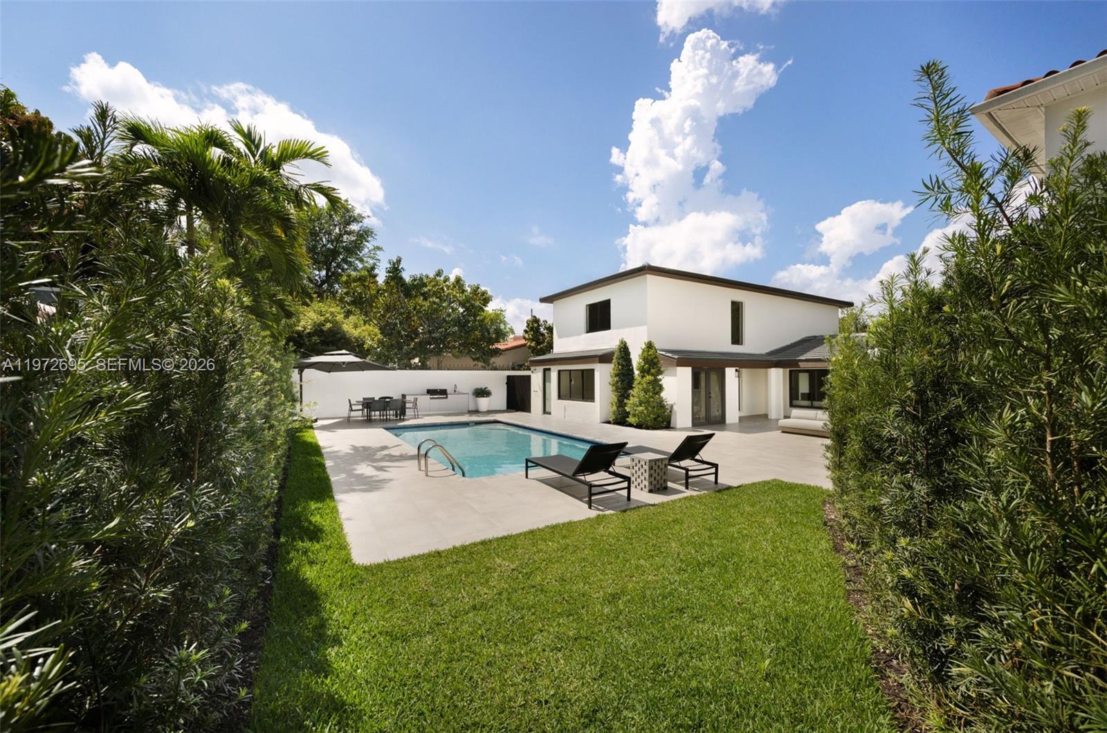 2805 Southwest 4th Avenue Miami, FL 33129 - Photo 33 of 42 a view of a backyard with sitting area