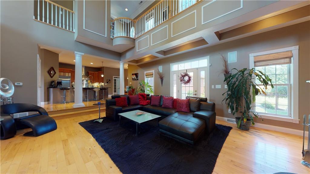 234 Reibold Road Renfrew, PA 16053 - Photo 4 of 19 a living room with furniture fireplace and wooden floor