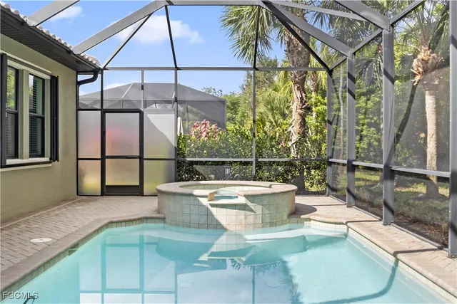 a view of a chairs and table in the patio