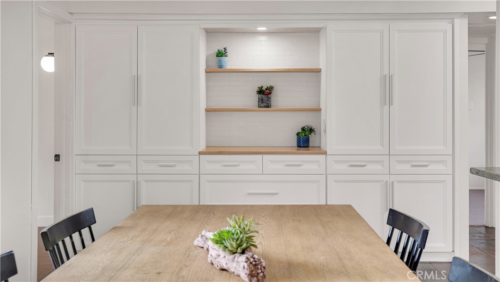 3317 Lees Avenue Long Beach, CA 90808 - Photo 18 of 75 Beautiful new wall of Pantry Storage with six additional drawers and multiple pullouts, and tons of storage - to be an envy and future design element for all Cliff May homeowners