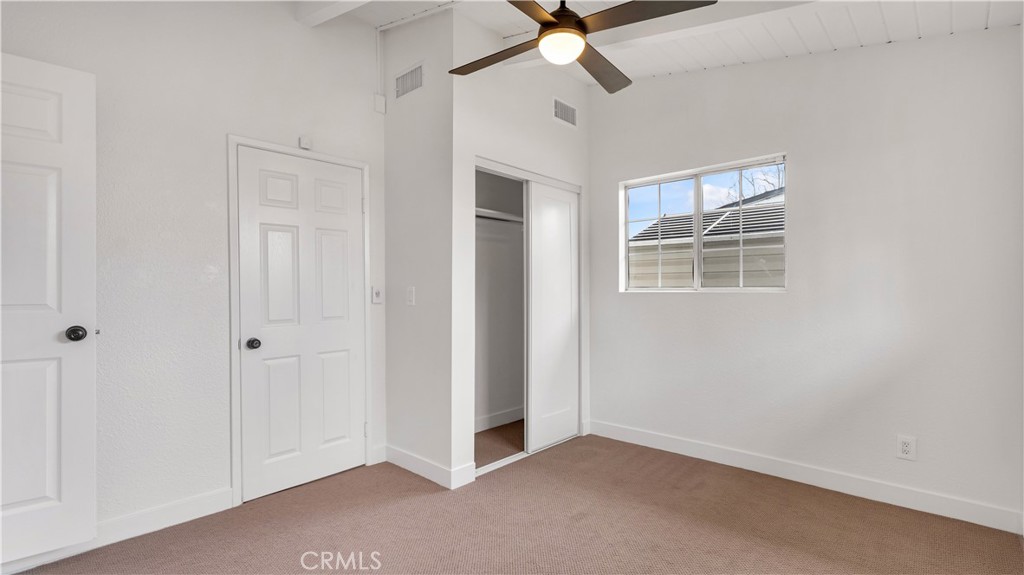 3317 Lees Avenue Long Beach, CA 90808 - Photo 32 of 75 Another Bedroom at the rear of the home with west and north facing windows, vaulted ceilings, closet.