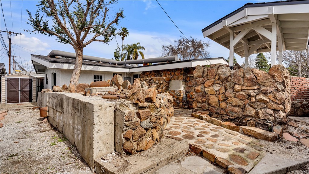 3317 Lees Avenue Long Beach, CA 90808 - Photo 48 of 75 View of the backside of the Bunker/Shelter structure and area that contains the natural ventilation shafts and emergency escape shuttle hatch that originates below in the old shower space.