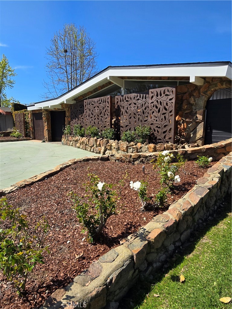 3317 Lees Avenue Long Beach, CA 90808 - Photo 59 of 75 White Iceberg Roses adorn front curb appeal