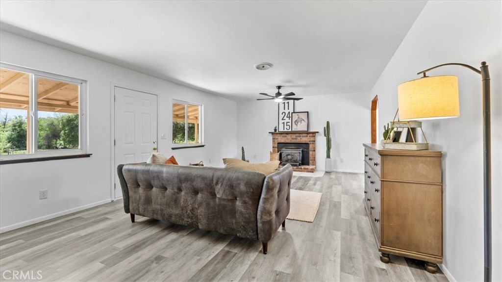 112 Los Verjeles Road Bangor, CA 95901 - Photo 14 of 48 a living room with furniture and a fireplace