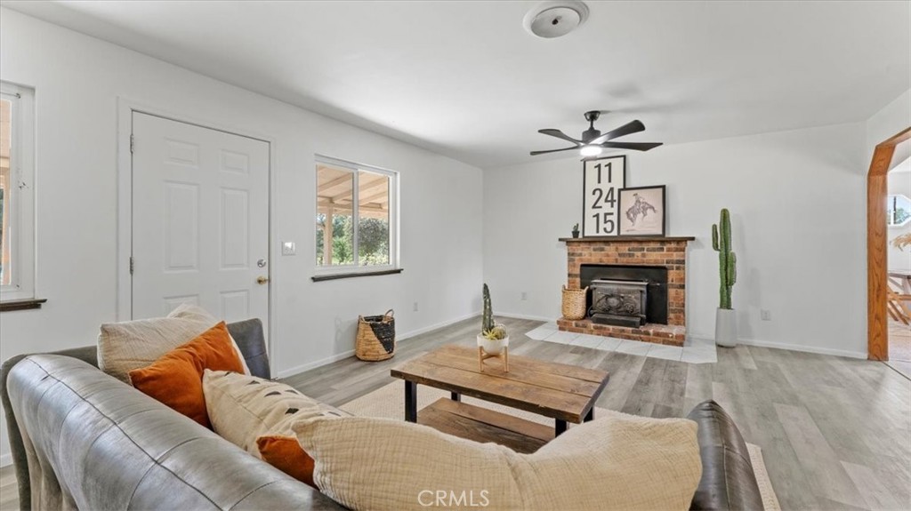 112 Los Verjeles Road Bangor, CA 95901 - Photo 15 of 48 a living room with furniture and a fireplace